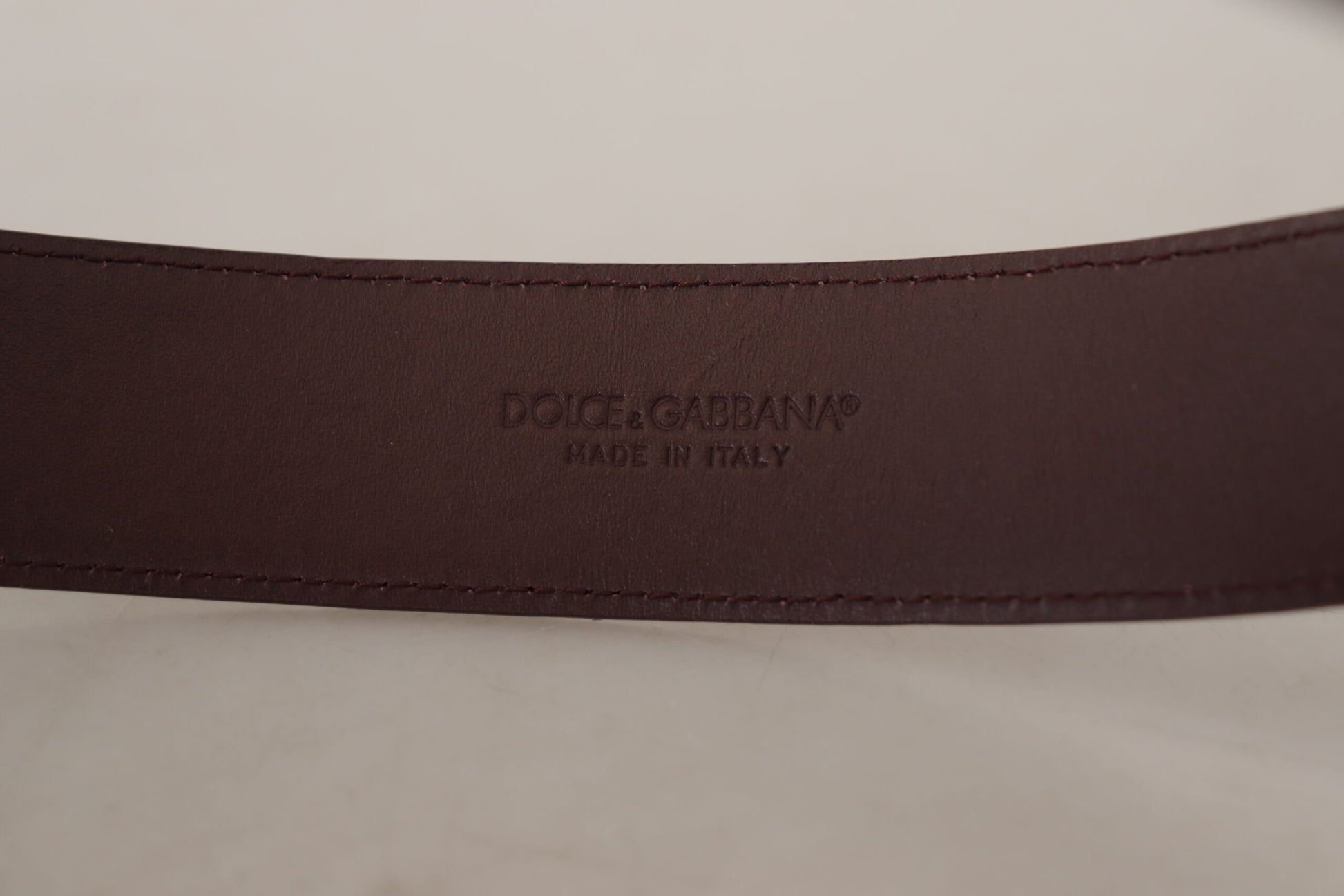 Elegant Maroon Leather Belt with Engraved Buckle